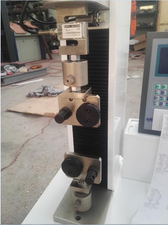 1675993302764556.jpg 縫合線拉伸疲勞試驗機(jī).jpg